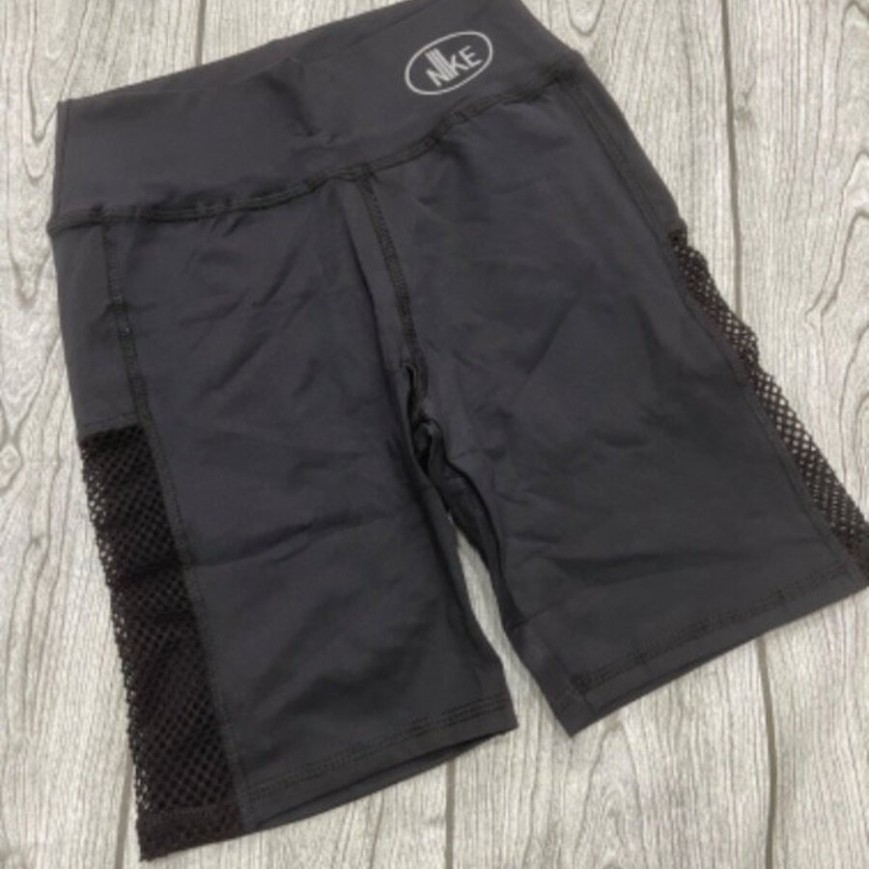 CICLISTA CON RED COSTADO