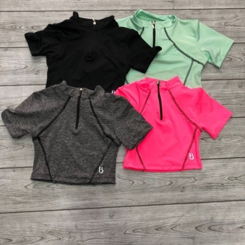 CROP CON COSTURA MEDIO CIERRE