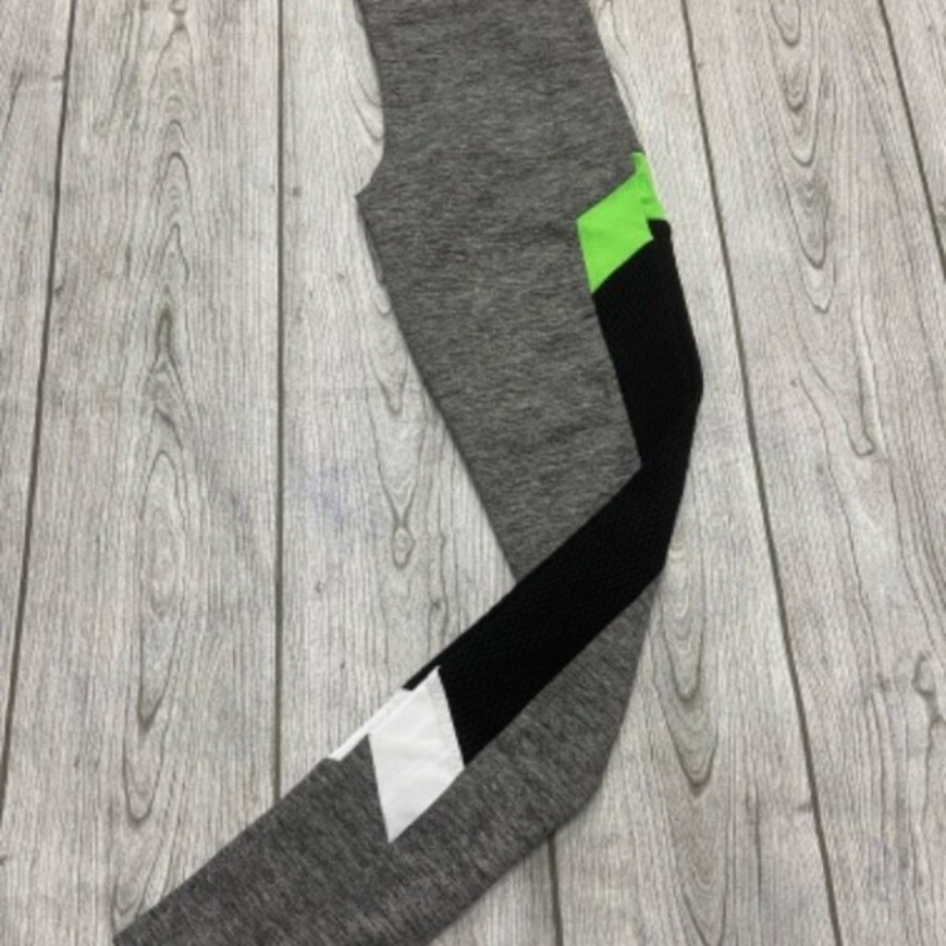 CALZA GRIS BOLSILLOS VERDE