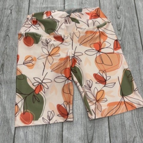 CICLISTA FLORES NARANJA