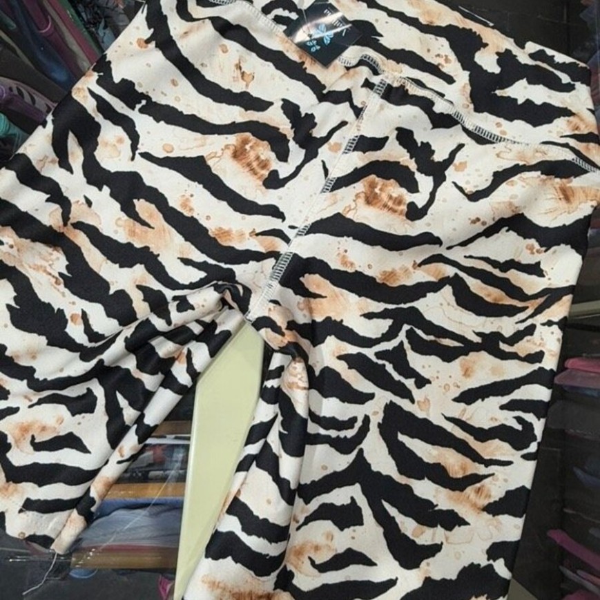 CICLISTA CEBRA MARRON Y NEGRO