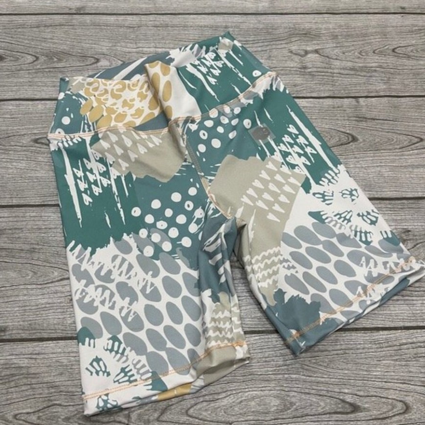 CICLISTA VERDE AGUA Y BLANCA AMARILLA