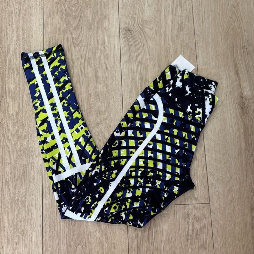 CALZA NEWOD AMARILLA CON AZUL