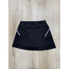 POLLERA SHORT NEGRA AL CUERPO