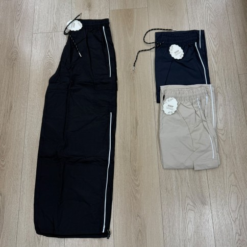 PANTALON RAYA ROMPEVIENTO SELE