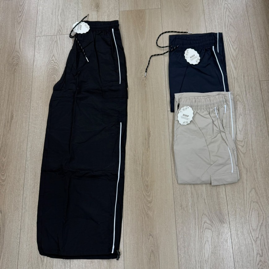 PANTALON RAYA ROMPEVIENTO SELE