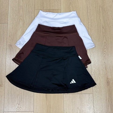 POLLERA ADIDXS DOBLE PICO